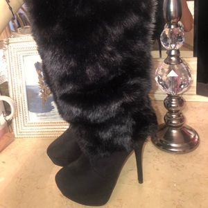 Black heeled fur boots